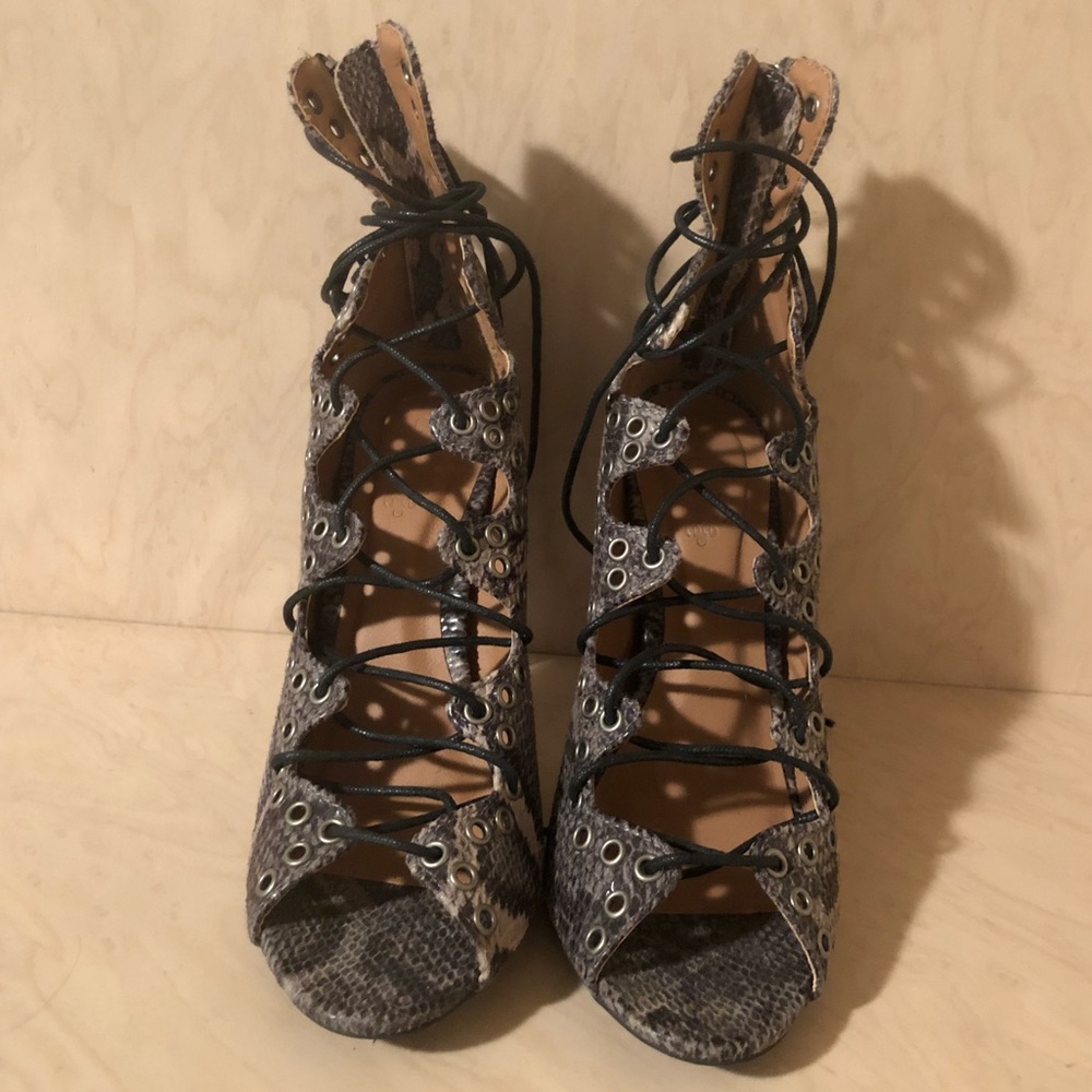 Strappy snakeskin heel